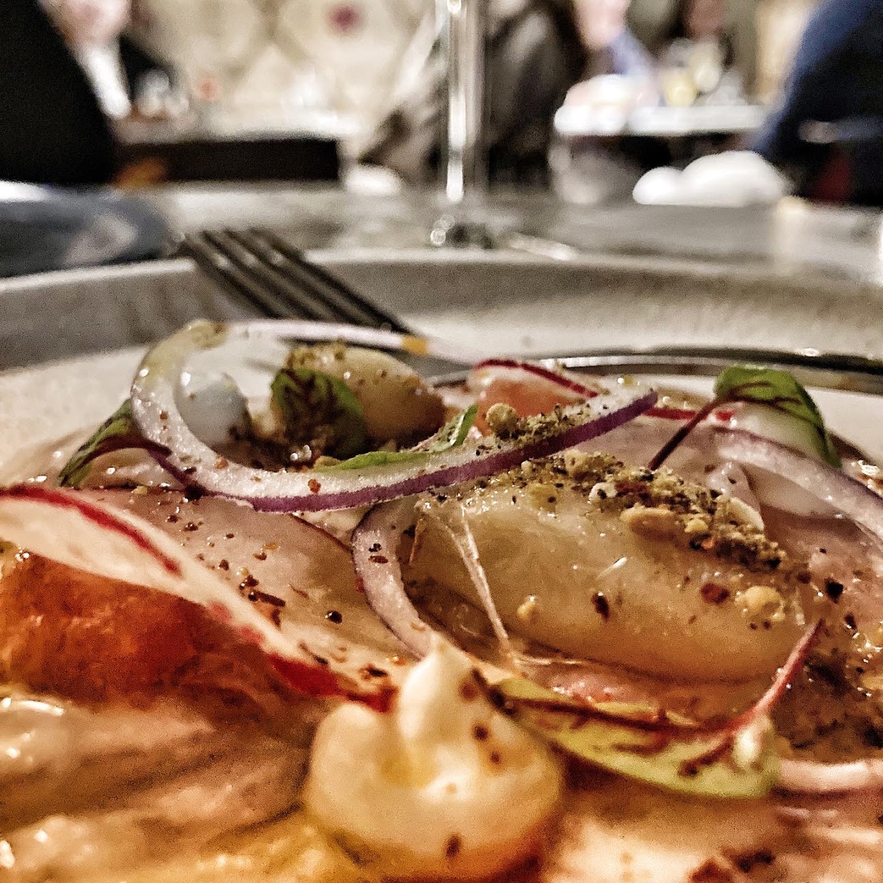 Seafood plate with herbs and labneh at Tayim