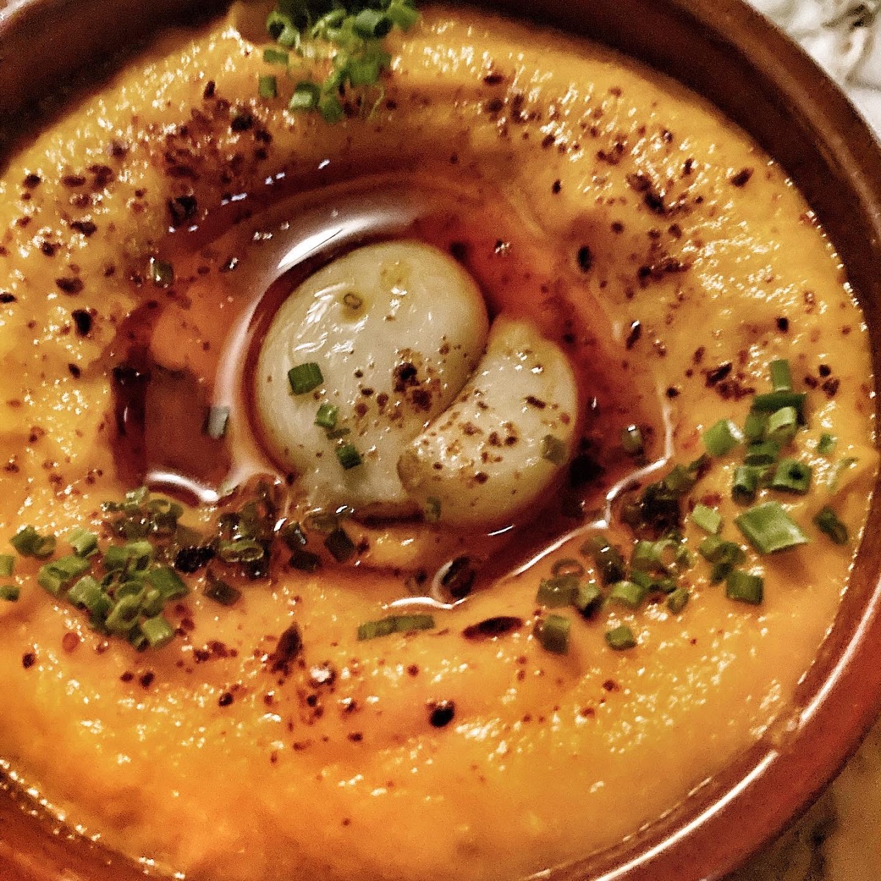 Hummus with olive oil and egg at Tayim