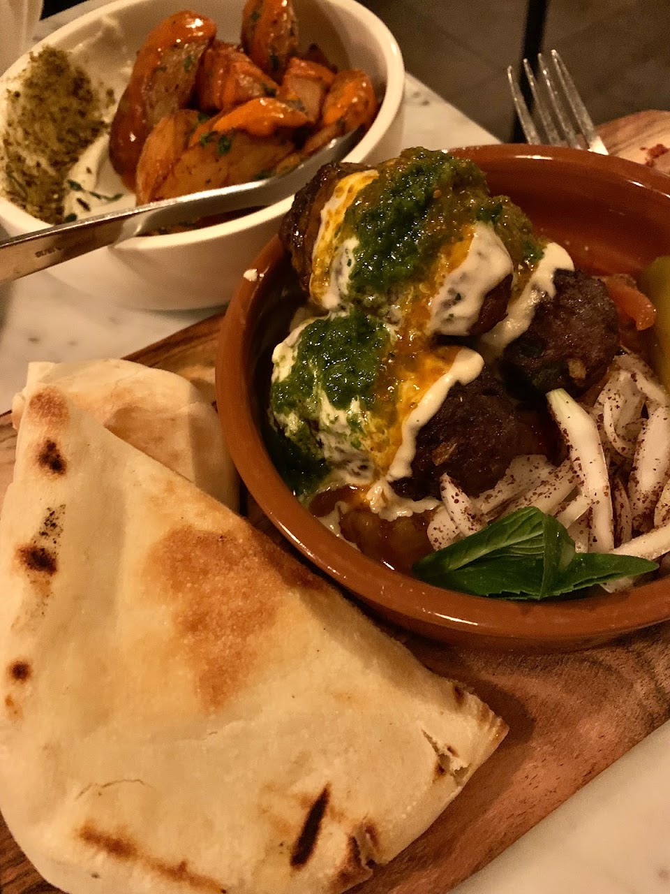 Flatbread and roasted vegetables at Tayim
